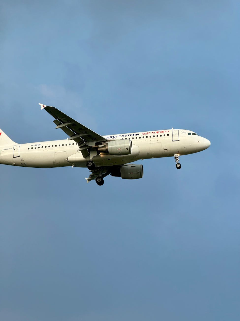 commercial airplane in clear blue sky
