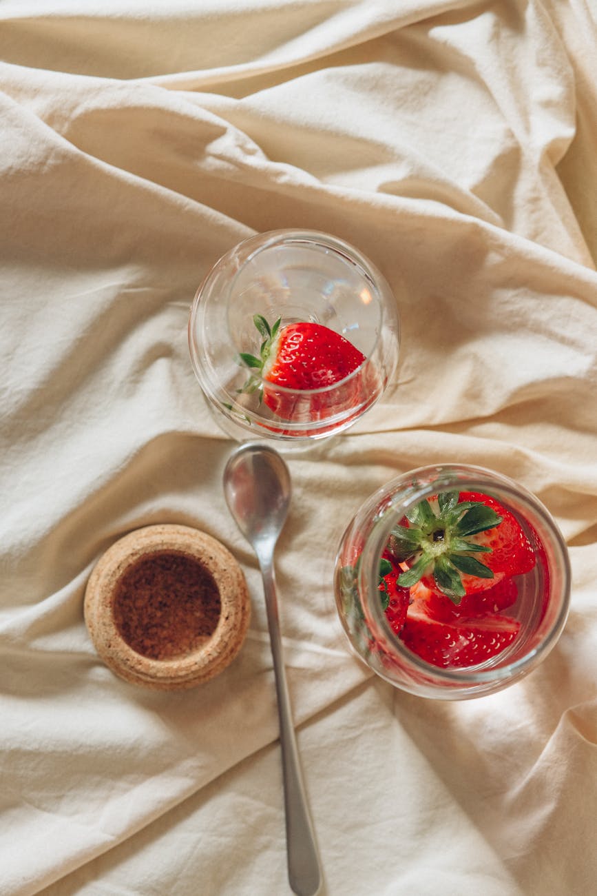 clear glass bowl with red liquid