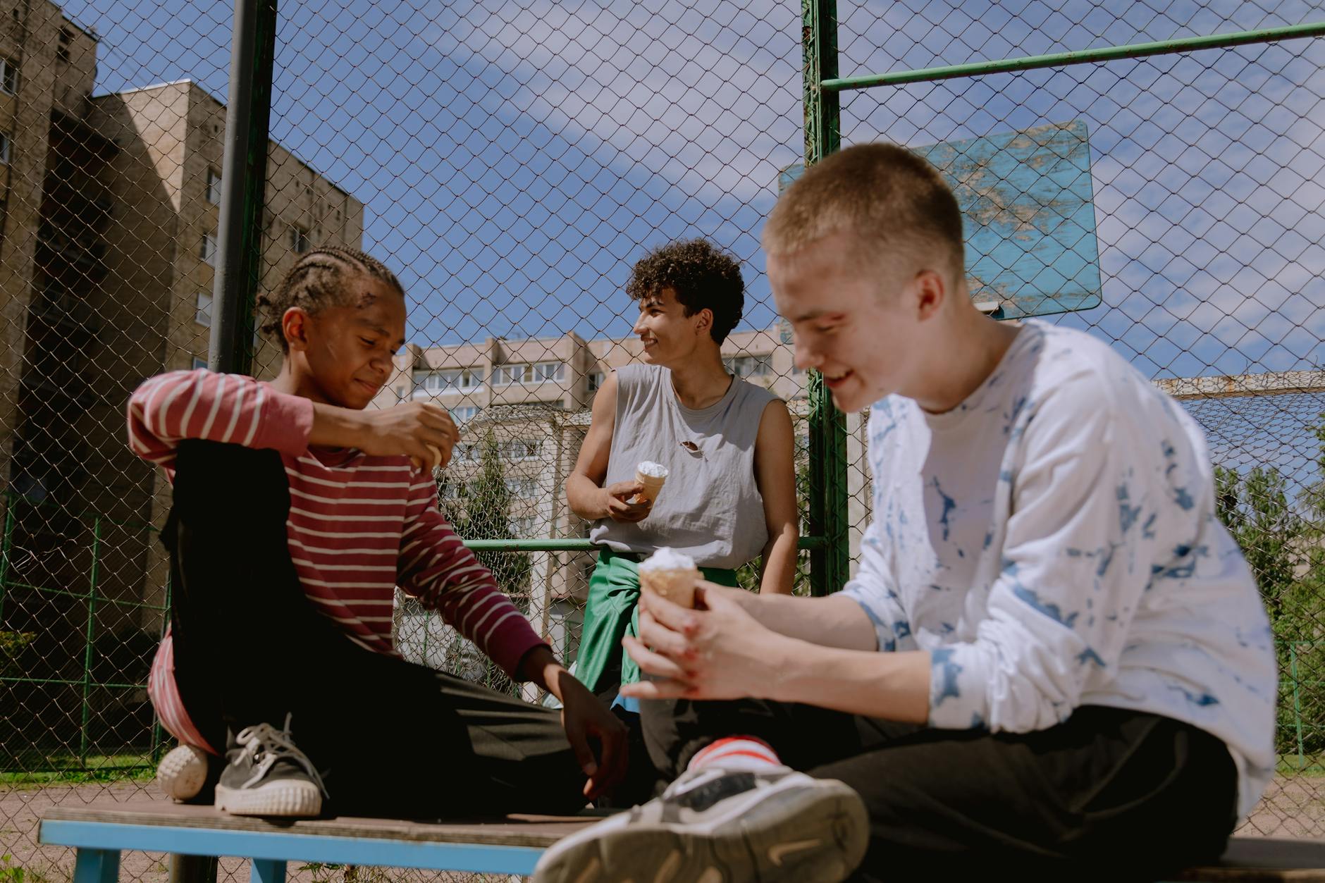 group of young men eating ice cream