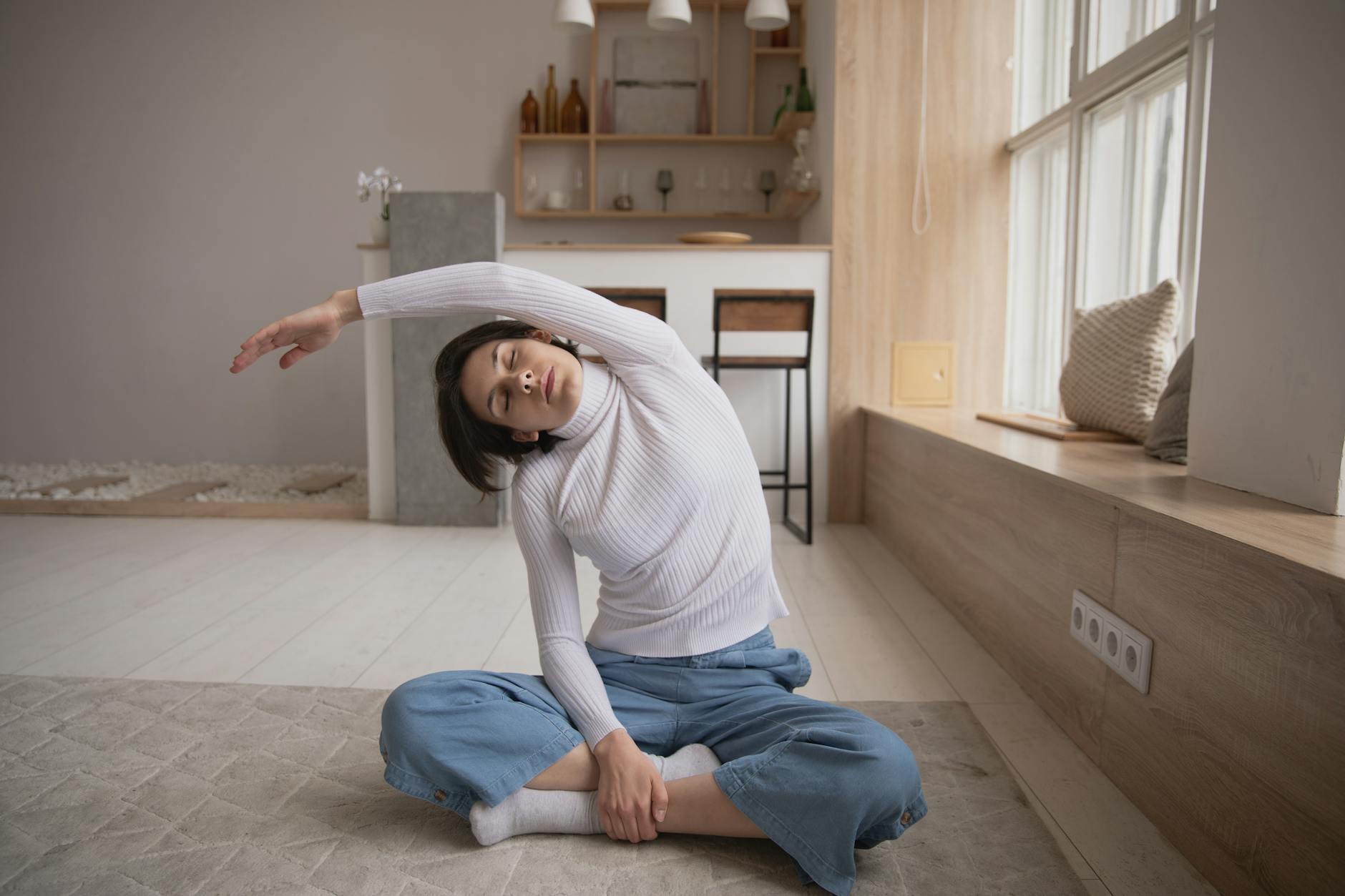 photo of woman stretching