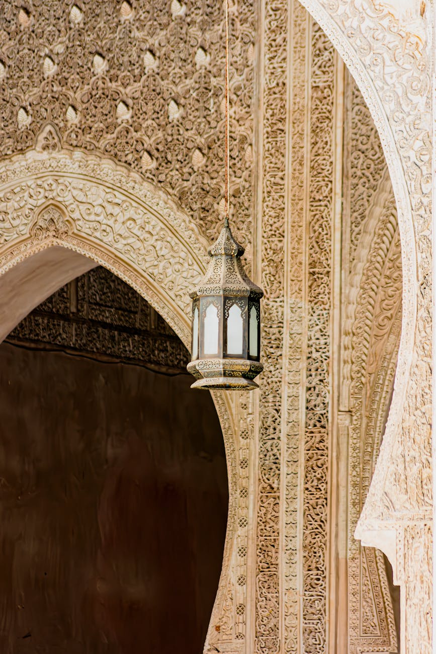 lamp and decorated wall behind